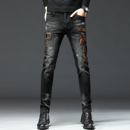 Stretch calf embroidered jeans